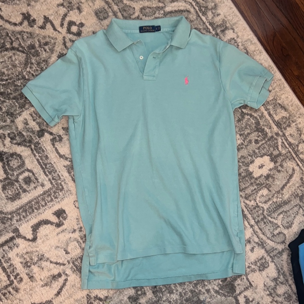 Blue/teal with pink logo polo